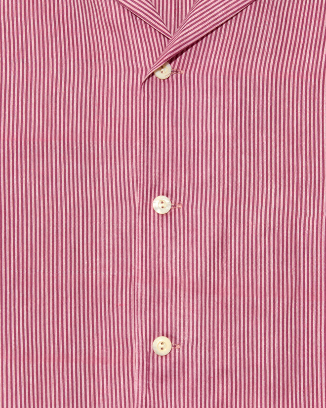 Close-up of the Berry Creme Stripe Shirt (size S/M), featuring red and white vertical stripes and white buttons.
