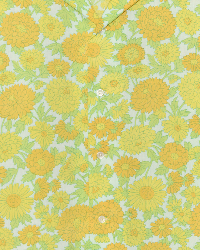 Close-up of the Dhalia Lime Long Sleeve Shirt (XL/XXL), featuring a unique yellow and green deadstock floral pattern and white buttons—a one-of-a-kind design.