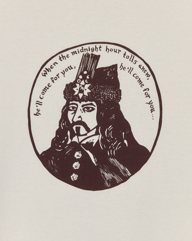 Illustration of a stern man in a crown with
