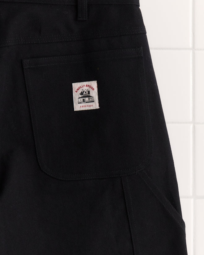 The Twill Knolly Brook Trousers - Black are 1950s-60s-inspired workwear pants with a large back pocket and a