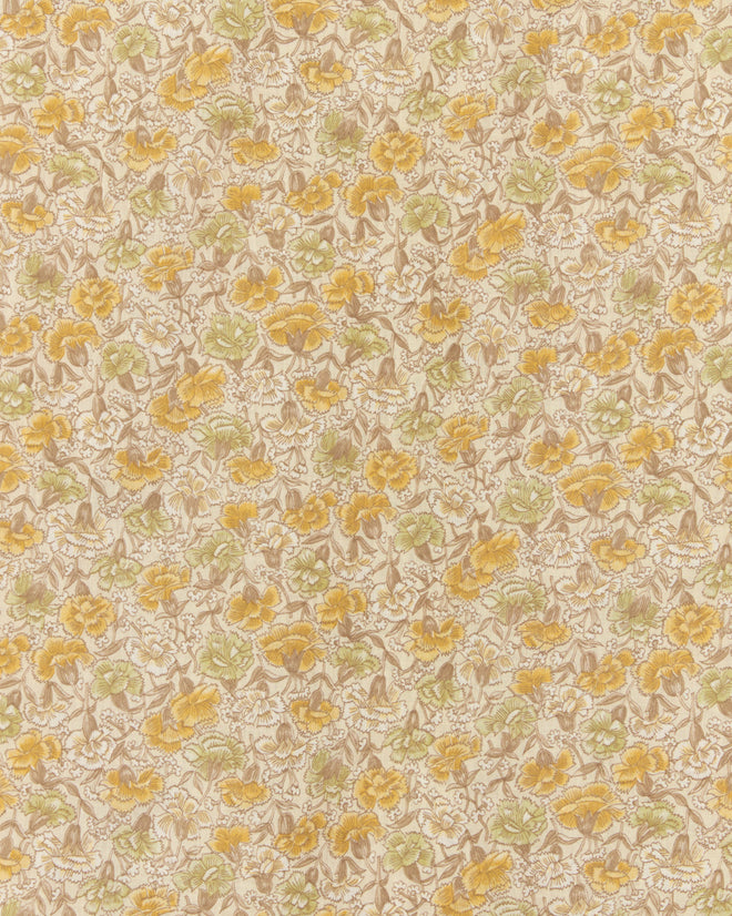 The Lion's Mane Floral Shirt (M/L) features a beige background with yellow and green floral patterns, echoing the unique charm of vintage wallpaper.