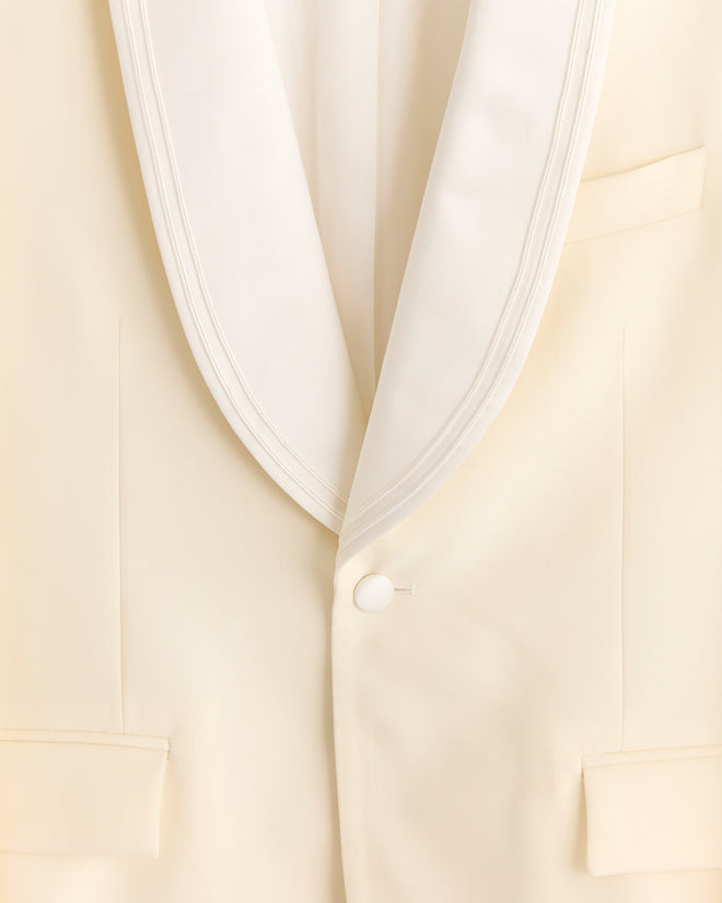 Close-up of the Meringue Shawl Collar Tuxedo Jacket in ivory wool, featuring a single button and elegant shawl collar.