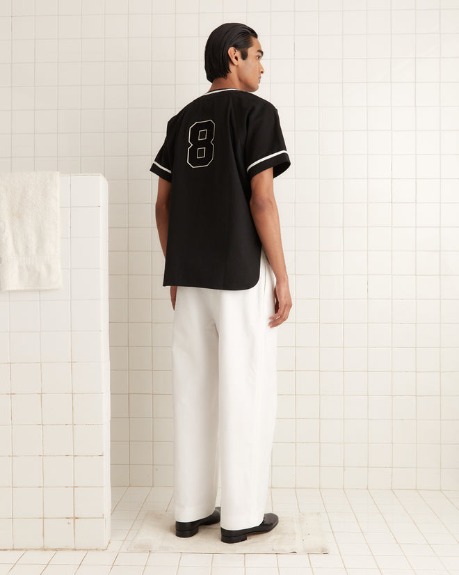 The individual in a black