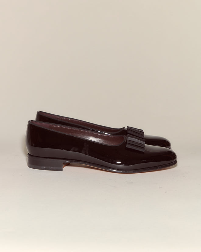 A pair of Patent Opera Pumps in shiny dark burgundy with bow detail, displayed against a plain light background.