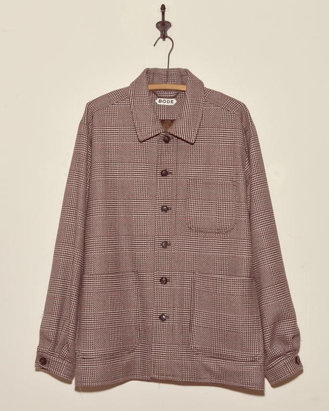 Pink Granite Jacket - L/XL: Unique button-up deadstock wool jacket in brown plaid, displayed hanging on a hook against a plain light-colored wall.