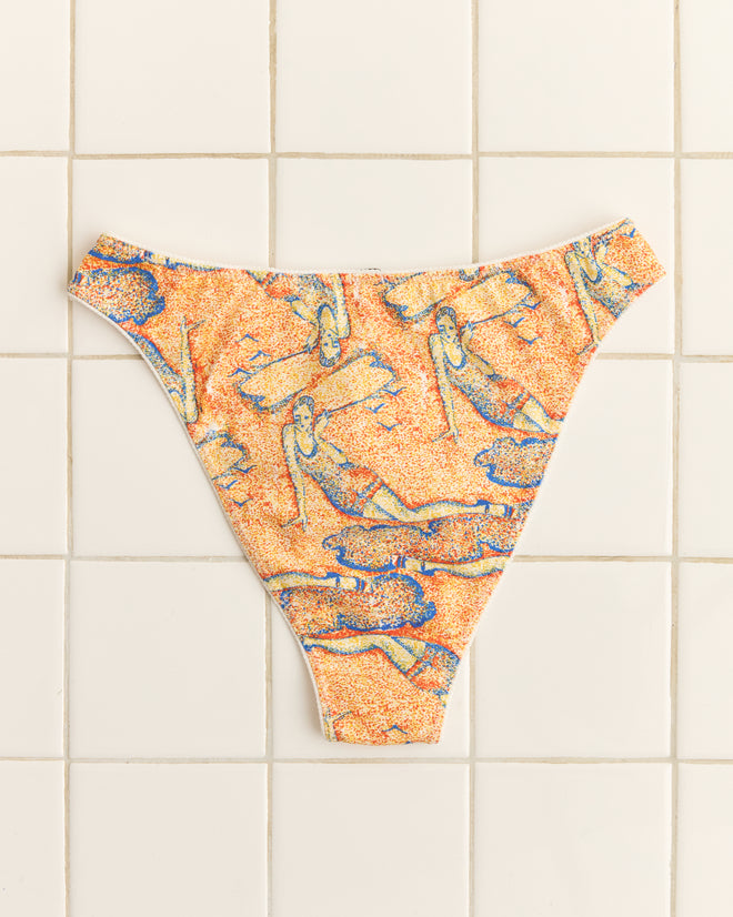 The Sandbank Briefs feature a vintage-inspired abstract blue and yellow pattern on a tiled white background.