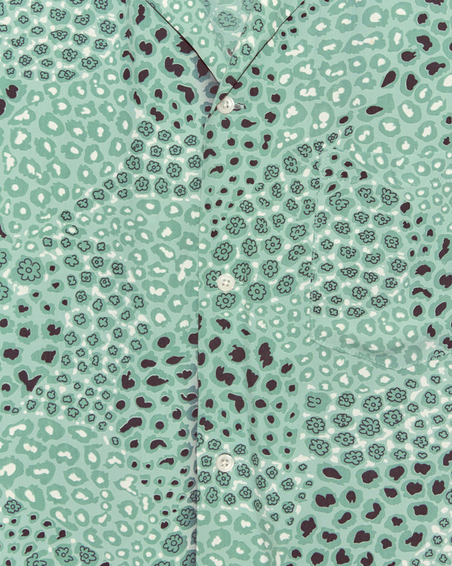 Close-up of the Sardine School Shirt in XXL, showcasing green abstract spots and small florals, with a pocket and buttons—a truly unique vintage piece.