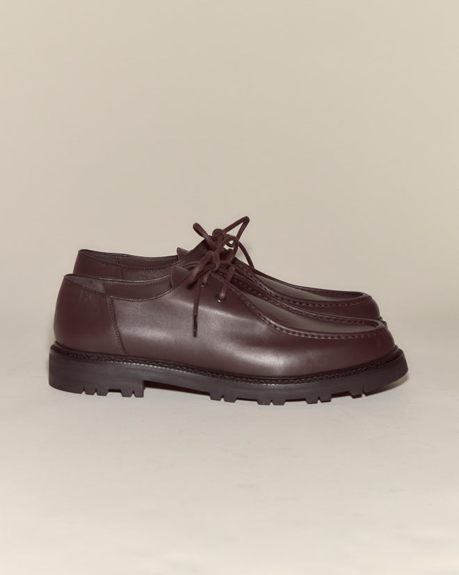 The University Shoes - Brown are dark brown calf leather lace-ups with thick soles, shown side by side on a plain background.
