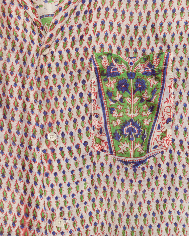 Close-up of the Verdigris Print Shirt - XXL, a unique raw silk shirt with a multicolored floral pattern and decorative front pocket, crafted from vintage sari fabric.
