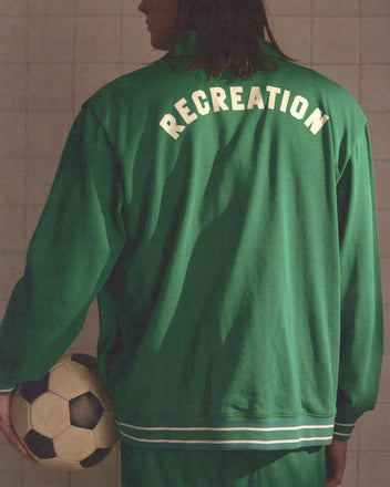 Person in a green Sophomore Jacket with 