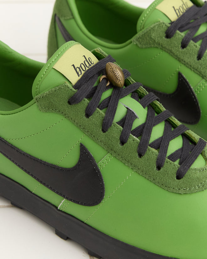 Green Bode Rec. and Nike Astrograbber sneakers feature a black swoosh, black laces, green suede trim with 