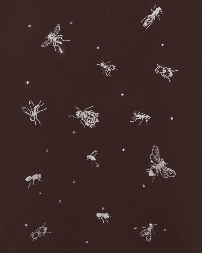 The Bug Tee features illustrations of various insects on a dark background with small white dots, giving it a vintage children's or spooky-cute Halloween tee vibe.