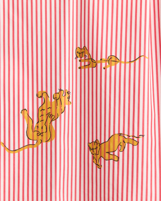 Three illustrated yellow tigers leap across a red and white vertical striped background on the Calder Painted Cirque Long Sleeve Shirt.