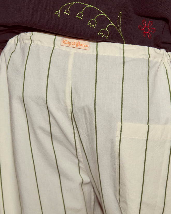 Celery Stripe Pajama Pants: white with green stripes, “City of Paris” label, 100% cotton. Style them easily with a dark floral-embroidered shirt.