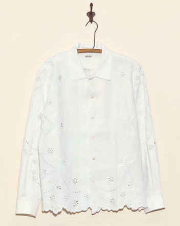Chamomile Patch Short Sleeve Shirt - M with floral eyelet embroidery, scalloped hem, and collar, hanging on a hook—a truly one-of-a-kind piece.