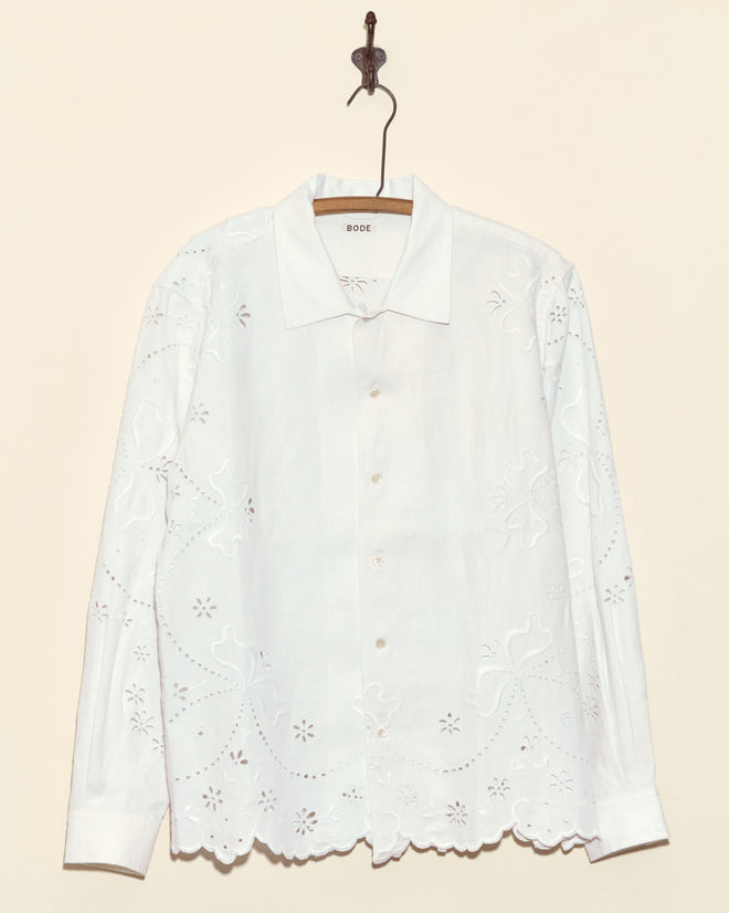 Chamomile Patch Short Sleeve Shirt - M with floral eyelet embroidery, scalloped hem, and collar, hanging on a hook—a truly one-of-a-kind piece.