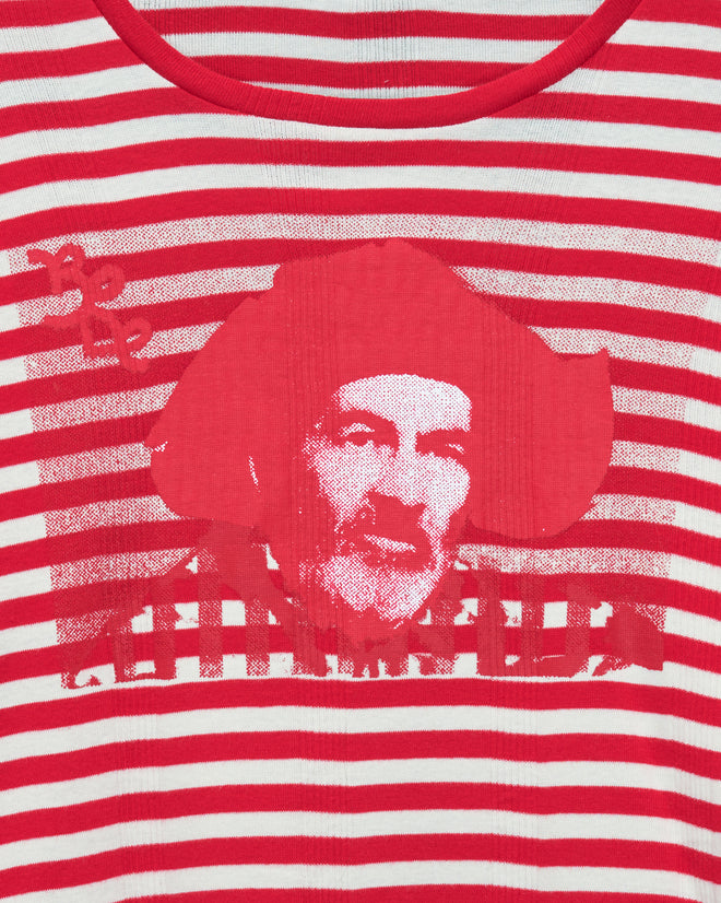 The Rib Stripe Hayes Long Sleeve Tee is a red and white striped shirt featuring a stylized image of the beloved Western-movie sidekick Gabby Hayes, complete with his classic cowboy hat, printed on the front.
