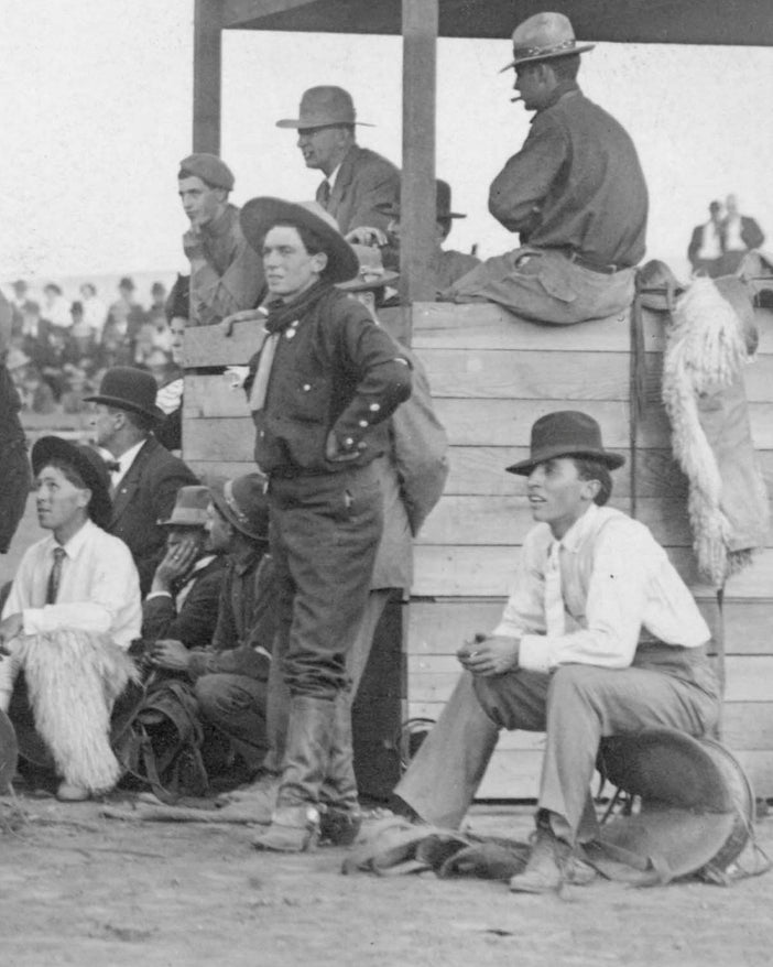 Historical photograph of cowboys at the Pendleton Round Up rodeo, 1910.