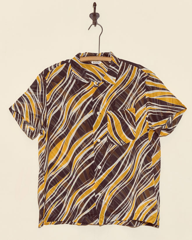 The Firelick Short Sleeve Shirt - M features yellow, white, and brown wavy stripes on a button-up design. Made in New York, this standout shirt brings unique style to your wardrobe.