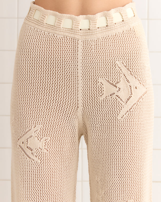 Angel Fish Joggers - Cream, crochet-knit with an angelfish pattern in light beige and featuring waist cut-out rectangles.