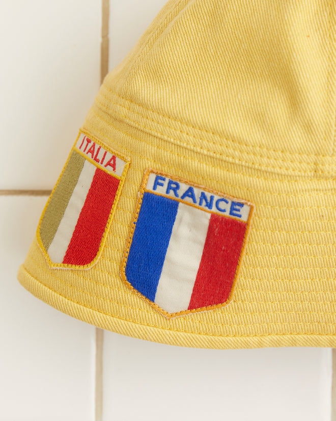 A yellow Patched Sailor Cap made of cotton twill, featuring 