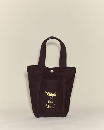The Small Geneva Tote is a black cotton canvas bag from Camp Geneva, featuring 