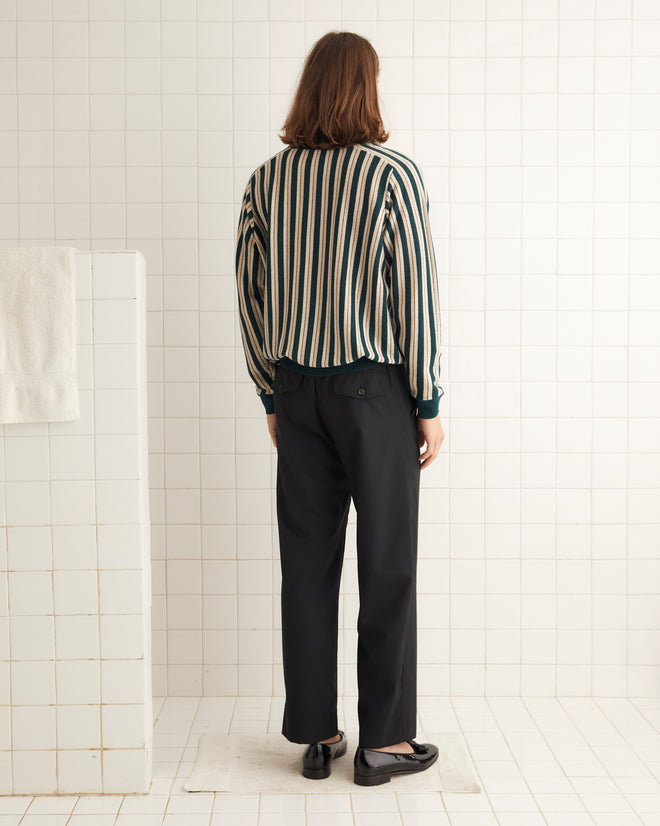 Green and cream wool blend long sleeve polo with stripes and two button collar.