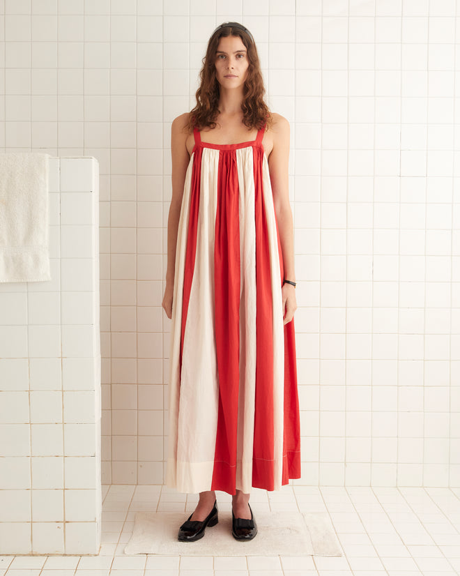 Red and cream cotton dress with a horizontal stripes and loose silhouette.