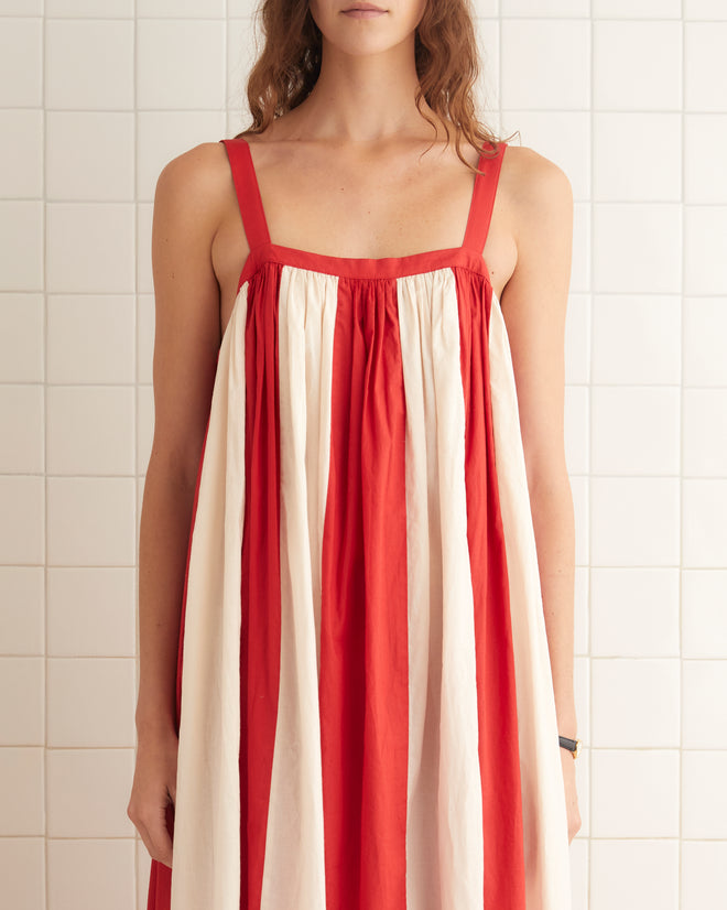 Red and cream cotton dress with a horizontal stripes and loose silhouette.