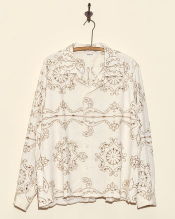 Montague Lace Long Sleeve Shirt - XL: white button-up with tan floral and geometric embroidery, displayed on a wall hook.