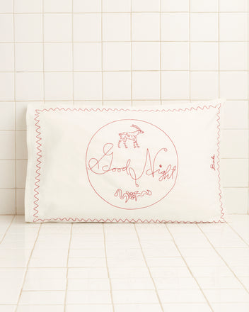 Introducing the Night and Day Pillowcases, a pair of exquisite white pillowcases adorned with intricate red embroidery patterns. Crafted from 100% cotton, these pillowcases are perfect for adding a touch of elegance to any setting, beautifully blending tradition with modern style.