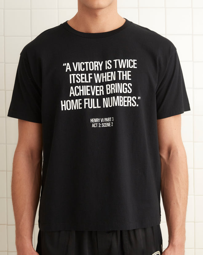 Black cotton short sleeve tee with the quote 