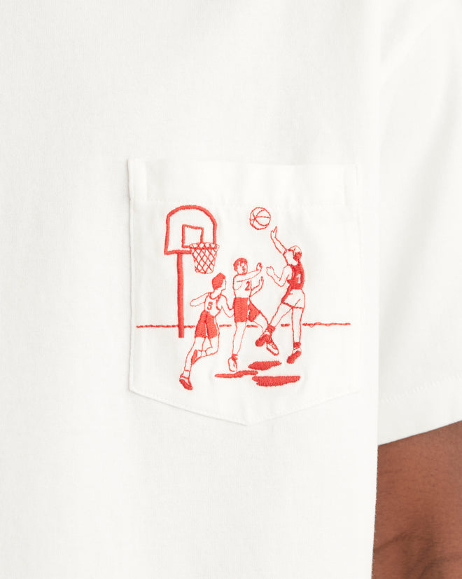 White cotton short sleeve tee with a red basketball embroidery on a left front pocket.