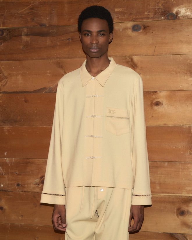 Ladder Crêpe Shirt in pale yellow cotton with button-loop closures and ladderwork embroidery at the cuffs.