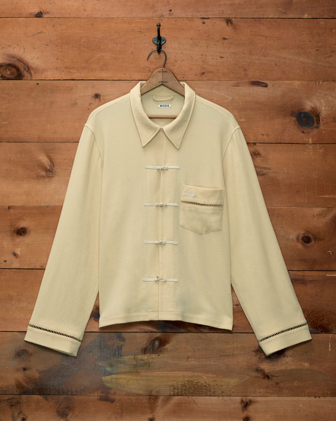 Ladder Crêpe Shirt in cream cotton with a pointed collar, toggle closures, and a single breast pocket.