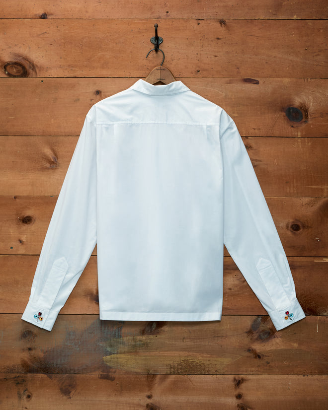 Clover Charm Long Sleeve Shirt in white cotton poplin with colorful, clover-shaped buttons at the cuffs.