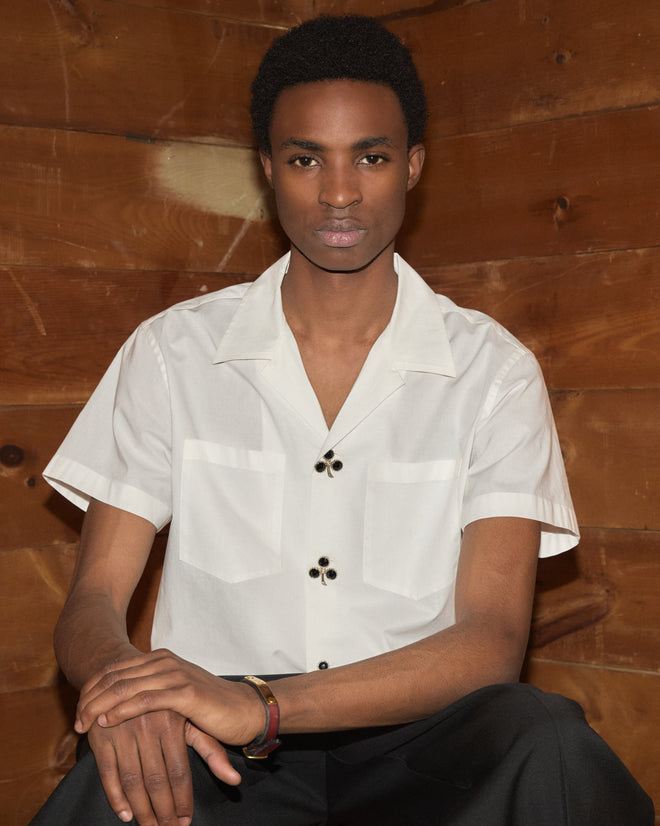 Clover Charm Short Sleeve Shirt in white poplin with gemstone clover charms.