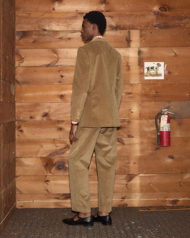 A person wearing a Western Corduroy Suit Jacket in tan with matching trousers.
