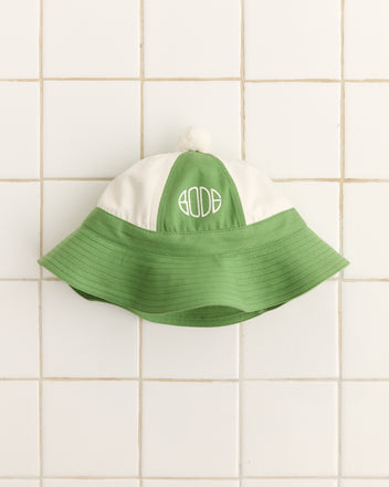 The Paneled Grandfather Hat in green and white, crafted from midweight canvas with the 