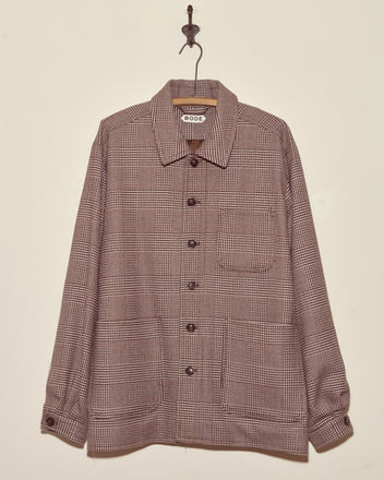 Pink Granite Jacket - L/XL: Unique button-up deadstock wool jacket in brown plaid, displayed hanging on a hook against a plain light-colored wall.