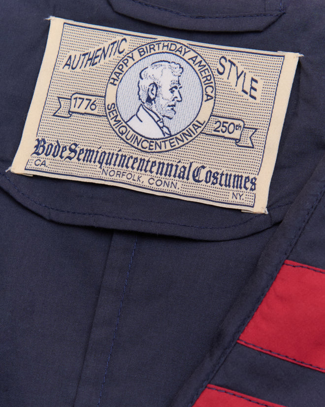 A fabric patch reads "Happy Birthday America Semiquincentennial 1776-2026" on the Centennial Dress - Blue/Red, ideal for matching with Liberty costumes or wearing to Fourth of July celebrations.