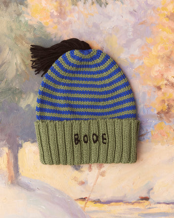 Roll-Up Tassel Beanie in green with a striped vintage design and the 