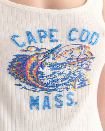 The Beaded Sailfish Tank is a white ribbed cotton top featuring 