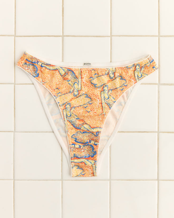 Sandbank Briefs, featuring vintage-inspired colorful patterns, are displayed on a white tiled background.