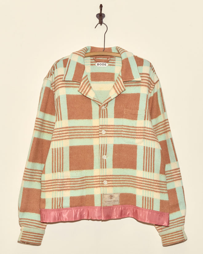 The Seafoam Plaid Jacket - XXL features brown, mint, and cream plaid with a pink satin hem. This unique, one-of-a-kind piece is made in New York and hangs stylishly on a hook.
