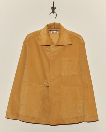 Custom Senior Cord Front Tab Jacket with three front pockets, displayed on a wall hook against a plain background—a classic personalized jacket.