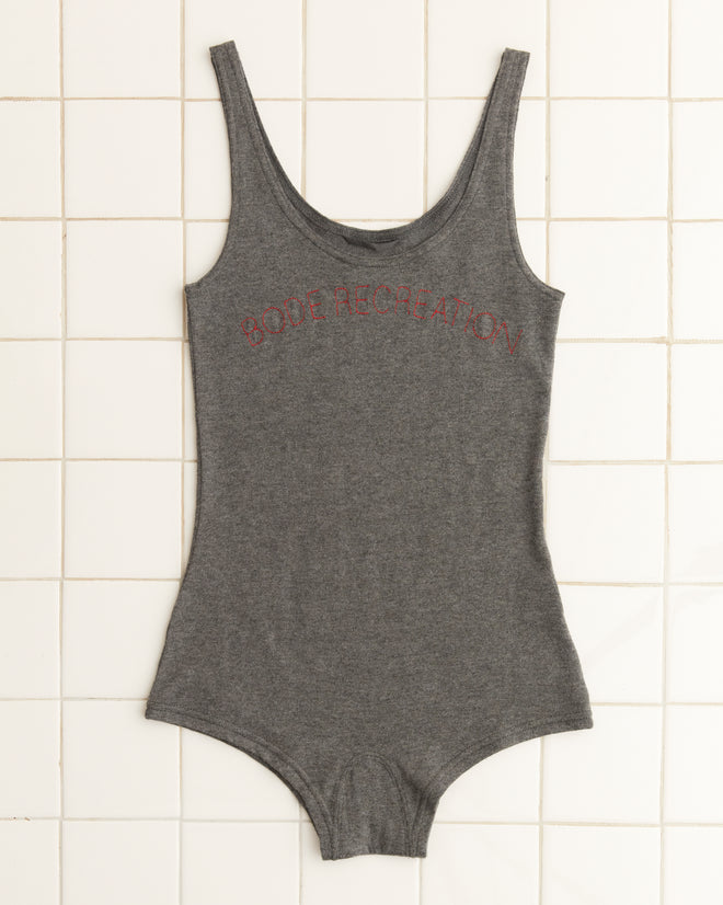 Shelly Romper - Grey, a gray sleeveless bodysuit made from organic cotton featuring the 