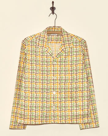 The Sorghum Patch Long Sleeve Shirt - XS features a colorful wavy grid pattern and deadstock fabric, making it truly one-of-a-kind.