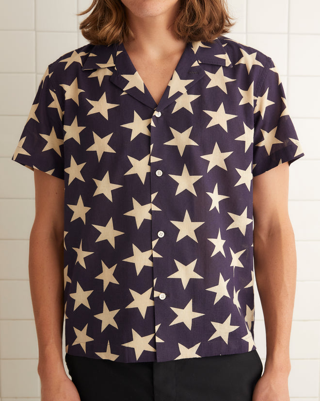 Navy cotton short sleeve shirt that features an all over star print.