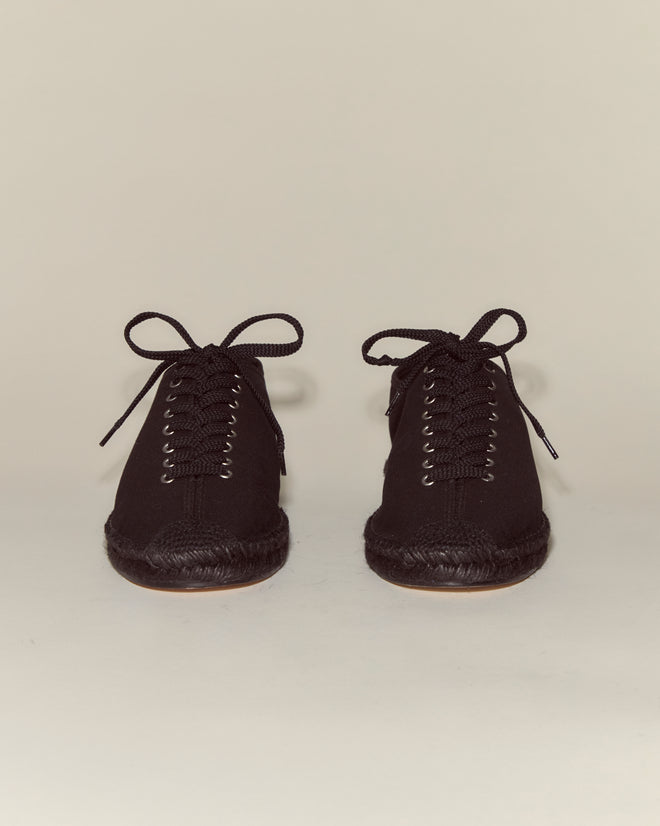 A pair of Tennis Espadrilles - Black featuring lace-up canvas design and thick soles, shown on a plain light background.